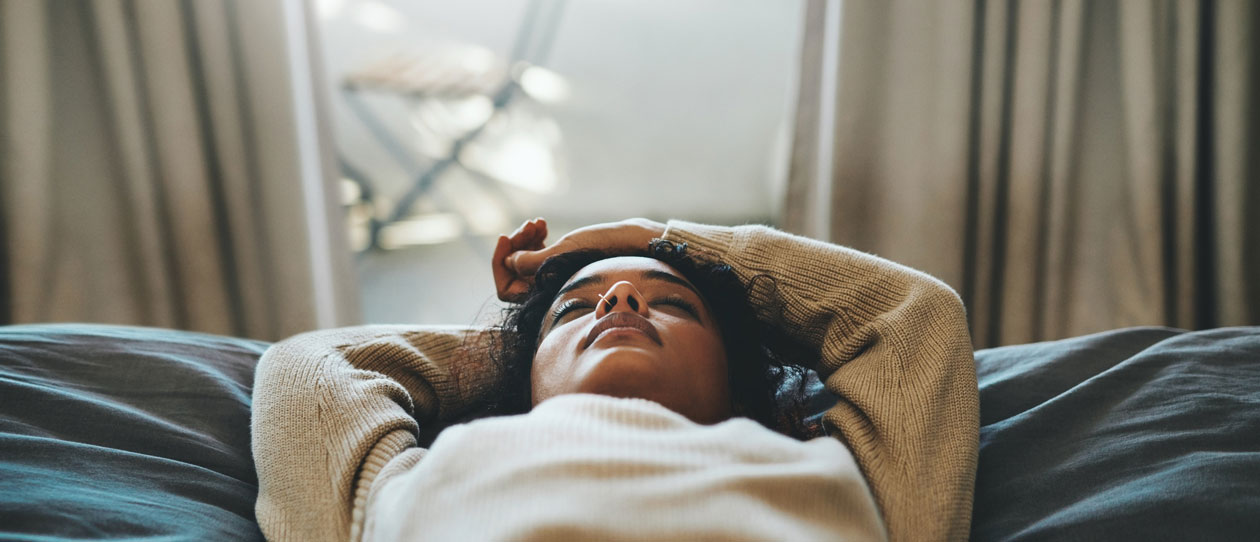 Young woman napping during the day